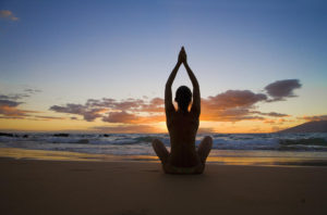 Hawaii, Maui, Silhouette Of Beautiful Girl Doing Yoga On The Beach.
