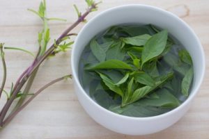 bigstock-Basil-leaves-in-a-cup-44455909